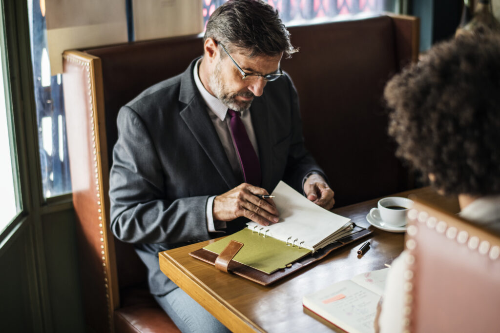 Business people discussing in the cafe